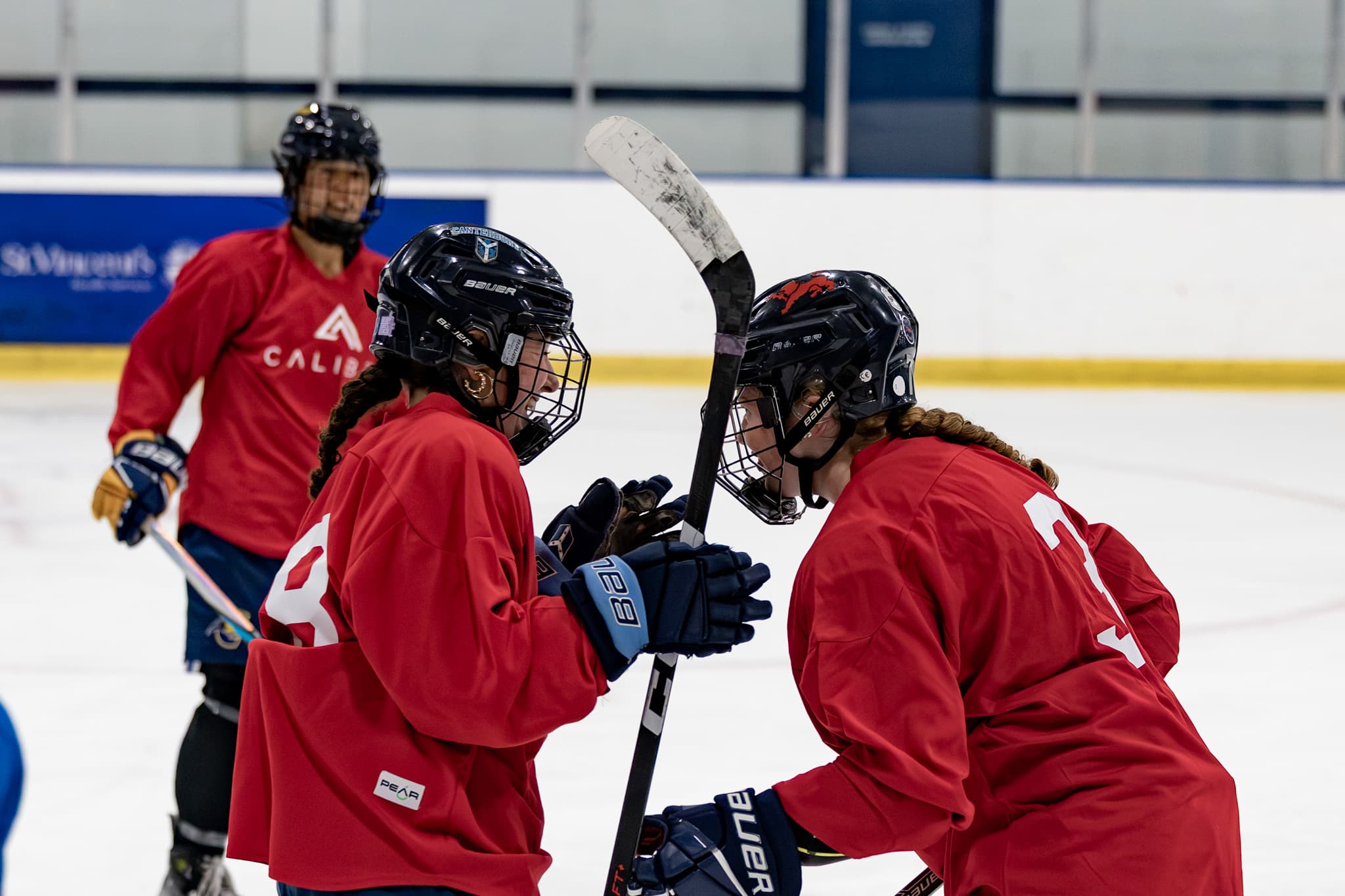 Youth ice hockey player on a breakaway during a New England game